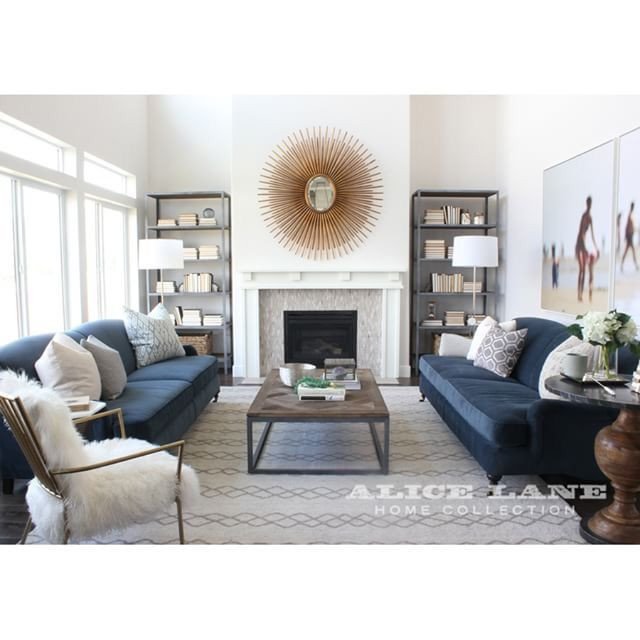 Navy Blue Living Room Decor Midnight Blue Couch White Walls Starburst Mirror